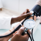 doctor taking blood pressure