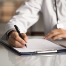 physician completing chart