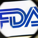 FDA logo through magnifying glass