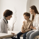 child and mother at check-up