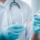 Doctor preparing a vaccine