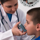 child with inhaler