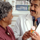 pharmacist with patient